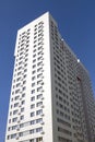 Multistory new modern apartment building against the blue sky. Stylish living block of flats. Newly built block of flats Royalty Free Stock Photo