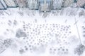 Multistory residential building with recreation area after snowfall. aerial top view Royalty Free Stock Photo