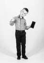 Multitasking. Businessman. Office life. Conversation. small boy with mobile phone. confident child has business start up Royalty Free Stock Photo