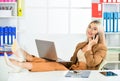 multitasking. freelancer business woman with computer. woman with mobile phone in office. millennial girl browsing Royalty Free Stock Photo