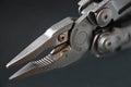 Multitool close up on dark glass Royalty Free Stock Photo