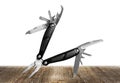 Multitool knife on white background. Royalty Free Stock Photo