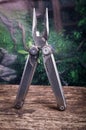 Multitool, multi purpose tool with open plyers Royalty Free Stock Photo