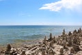 A multitude of cairns lining the rocky shoreline of Lake Michigan in Cave Point County Park Royalty Free Stock Photo