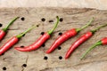 Multitude of red chili peppers on wooden table