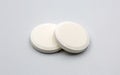 Effervescent tablet pills closeup on white