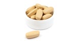 Multivitamin pills in the plastic cap Royalty Free Stock Photo