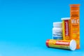 Multivitamin tablets and Vitamin C container closeup. Royalty Free Stock Photo