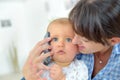 mum baby with phone Royalty Free Stock Photo