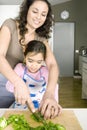 Mum and Daughter Chopping Veggies Royalty Free Stock Photo