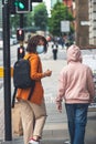 Mum and daughter in face mask are shopping