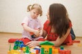 Mum and daughter play in room