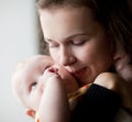 Mum kisses small son. Royalty Free Stock Photo