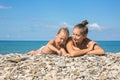 Mum with son on beach Royalty Free Stock Photo