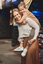 mum and teenage daughter having fun on a walk in the city. Royalty Free Stock Photo