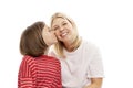 Mum with a teenager daughter laughing and hugging, isolated on white background. Tenderness and love Royalty Free Stock Photo