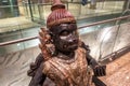 MUMBAI AIRPORT, INDIA DECEMBER 31, 2018: Publicly exhibited antic wooden sculpture of Hanuman, known as the Lord of Celibacy,