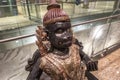 MUMBAI AIRPORT, INDIA JANUARY 02, 2019: Publicly exhibited antic wooden sculpture of Hanuman, known as the Lord of Celibacy,