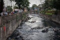 Mumbai,India,August-25-2019:Open sewage gutter running through busy resedential location: Open sewage poses health hazards to