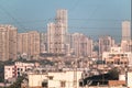 A skyline of high rise skyscrapers and power lines in the suburb of Kandivali in the city of Mumbai Royalty Free Stock Photo