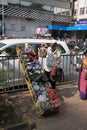 Mumbai/India - 24/11/14 - Dabbawala delivery at Churchgate Railway Station in Mumbai with dabbawala unloading tiffins Royalty Free Stock Photo