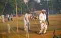 Unidentified boys practicing batting to improve cricketing skills at Mumbai ground