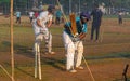 Unidentified boys practicing batting to improve cricketing skills at Mumbai ground