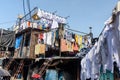 Indian woker in Dhobi Ghat is outdoor laundry in Mumbai. India Royalty Free Stock Photo