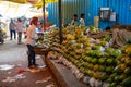 Mumbai, India - Lots of papaya fruits for sale at the Crawford Market, as workers stack the papayas in rows
