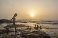 Mumbai, Maharashta / India - May 21 2020: Young children bathing and playing with friends group