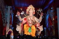 Close up view of idol of lord Ganesha on smartphone.