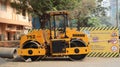 A road roller is a engineering vehicle used to compact soil, gravel, concrete