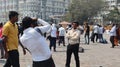 People getting their photoshoot at a tourist place.