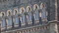 Windows of an old gothic structure of the victorian era. Royalty Free Stock Photo