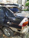 A damaged car in a road accident, Rear and back side of a car.