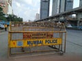 Mumbai traffic police barricade and sign board on the street of Bombay. Road safety, crime prevention and public protection are th Royalty Free Stock Photo