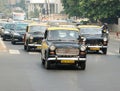 Mumbai traffic with several classical ambassador cabs,India Royalty Free Stock Photo