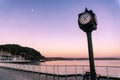 The Mumbles Pier Centenary Clock at dawn, on the Mumbles Esplanade in Swansea Royalty Free Stock Photo