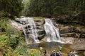 Mumlavsky vodopad waterfall in Krkonose Giant Mountains in the Mumlava river with tourists visiting the landmark Royalty Free Stock Photo