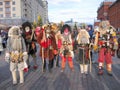 Mummers in masks, holiday of Maslenitsa in Moscow, Russia