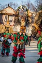 Mummers perform rituals to scare evil spirits at Surva festival at Pernik in Bulgaria. The people with the masks are called Kuker