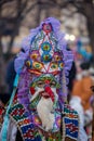 Mummers perform rituals to scare evil spirits at Surva festival at Pernik in Bulgaria. The people with the masks are called Kuker