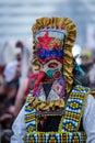 Mummers perform rituals to scare evil spirits at Surva festival at Pernik in Bulgaria. The people with the masks are called Kuker