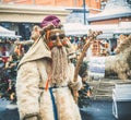 MOSCOW, RUSSIA- FEBRUARY 2017: The mummer walk the streets and entertain the people. Disguised in the wood goblin, the