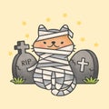 Mummy cat costume sitting in front of tombstones