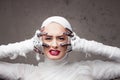 Mummy girl scream in shock. Portrait of a young beautiful woman in bandages all over her body. Royalty Free Stock Photo