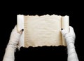 Mummy in hand keeps manuscript Royalty Free Stock Photo