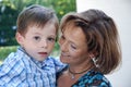 Little boy with freckles and his mother