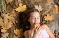 Munching an apple. Organic and natural food for kids health. Small girl likes the taste of apple fruits. Little girl Royalty Free Stock Photo