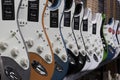 Fender Stratocaster guitar display at a music store. Strats are world renowned for their distinctive clean sound